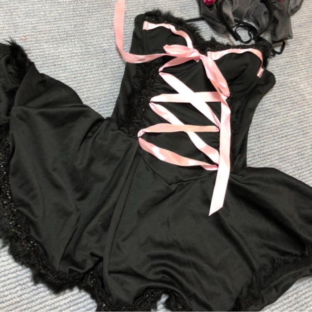 Leg Avenue sexy black boned corset dress. X-Small: With a shoulder/arm cover.